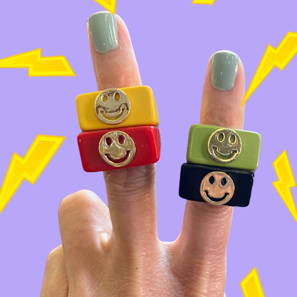 Red resin smiley happy face festival ring.